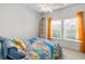 Bedroom featuring a colorful bedspread, built-in shelving, and a window at 2568 Goldfinch Dr., Myrtle Beach, SC 29577