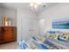 Bedroom featuring a colorful bedspread, a dresser, and a closet at 2568 Goldfinch Dr., Myrtle Beach, SC 29577