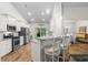 Bright kitchen featuring stainless steel appliances, granite countertops, breakfast bar and white cabinetry at 2568 Goldfinch Dr., Myrtle Beach, SC 29577