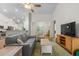 Bright living room with high ceilings, seamlessly connecting the kitchen and dining spaces at 2568 Goldfinch Dr., Myrtle Beach, SC 29577