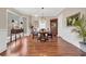 Elegant dining room with wood floors, chandelier and classic wainscoting at 3369 Collins Creek Dr., Murrells Inlet, SC 29576