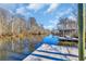 Dock on serene waterway is perfect for boating, fishing, and enjoying nature at 3369 Collins Creek Dr., Murrells Inlet, SC 29576