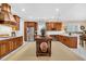 Spacious kitchen with custom wood cabinetry and center island at 3369 Collins Creek Dr., Murrells Inlet, SC 29576