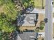 Aerial view of a well-maintained property with lush landscaping and a spacious driveway at 356 Carriage Lake Dr., Little River, SC 29566