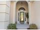 Arched front entryway with glass paneled door at 356 Carriage Lake Dr., Little River, SC 29566