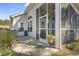 Screened porch with views of trees at 356 Carriage Lake Dr., Little River, SC 29566