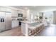 Modern kitchen featuring granite countertops, stainless steel appliances, and an island with barstool seating at 365 Rookroost Circle, Conway, SC 29526