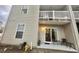 Outdoor living with a balcony, sliding glass doors, and neutral siding at 3677 Claypond Village Ln. # 4, Myrtle Beach, SC 29572