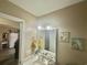 Bathroom featuring neutral walls, vanity with sink, mirror with sconces, and decorative wall art at 3677 Claypond Village Ln. # 4, Myrtle Beach, SC 29572