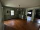 Dining room with hardwood floors, neutral walls, and a chandelier at 402 Wilkinson St., Georgetown, SC 29440