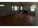 Living room with hardwood floors, neutral walls, and a fireplace at 402 Wilkinson St., Georgetown, SC 29440