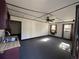 Living room featuring carpet, neutral walls, and multiple windows at 402 Wilkinson St., Georgetown, SC 29440