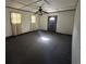 Living room featuring carpet, neutral walls, and a door at 402 Wilkinson St., Georgetown, SC 29440