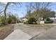 Driveway featuring a view to the two-car garage with an additional parking area at 408 Sunset Trail, Myrtle Beach, SC 29577