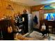 Living room features wood paneling, a modern refrigerator and other unique design elements at 408 Sunset Trail, Myrtle Beach, SC 29577