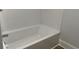 This is a close-up shot of a new, white bathtub with modern fixtures at 415 Circle Dr., Johnsonville, SC 29555