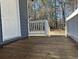 Wooden deck of the home with door and white railing at 415 Circle Dr., Johnsonville, SC 29555