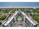 Aerial view of condominium complex on the beach with a central courtyard pool at 423 Parker Dr. # 306, Pawleys Island, SC 29585