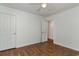 Bedroom featuring hardwood floors and large closet with white doors at 4305 Frontier Dr., Myrtle Beach, SC 29577