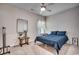 Cozy bedroom featuring carpeted floors, a ceiling fan, and a comfortable bed with stylish bedside furniture at 477 Cane Branch Rd., Loris, SC 29569