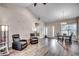 Open concept living room features luxury vinyl plank flooring and abundant natural light at 477 Cane Branch Rd., Loris, SC 29569