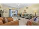 Bright living room featuring tile flooring and access to a private balcony at 4843 Luster Leaf Circle # 105, Myrtle Beach, SC 29577