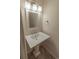 Bathroom with a pedestal sink and a classic framed mirror at 504 30Th Ave. N # 3, Myrtle Beach, SC 29577