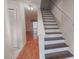 Foyer with staircase and view into living area featuring hardwood floors at 504 30Th Ave. N # 3, Myrtle Beach, SC 29577