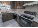 Kitchen featuring white countertops, black dishwasher and black electric stove at 504 30Th Ave. N # 3, Myrtle Beach, SC 29577