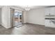 Dining area with sliding glass doors to the outside and modern chandelier at 520 Combine Dr., Conway, SC 29527