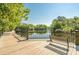 View of the Riverwalk in Conway South Carolina, surrounded by mature trees and landscaping at 520 Combine Dr., Conway, SC 29527