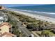 Aerial view of a beach with a road nearby at 5511 N Ocean Blvd. # 1006, Myrtle Beach, SC 29577