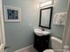 This bathroom features a vanity, mirror, and toilet; perfect for guests at 5511 N Ocean Blvd. # 1006, Myrtle Beach, SC 29577