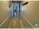 Hallway with tile flooring and decorative wall accents at 5511 N Ocean Blvd. # 1006, Myrtle Beach, SC 29577