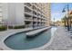 Exterior shot of the long and narrow outdoor pool at 5511 N Ocean Blvd. # 1006, Myrtle Beach, SC 29577