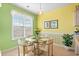 Cozy breakfast nook with bright walls and natural light, adjacent to the kitchen area at 5719 Whistling Duck Dr., North Myrtle Beach, SC 29582