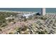Aerial view of a sprawling complex with condos, RV park, parking, and beach access at 5907 S Kings Hwy. # 1409, Myrtle Beach, SC 29575