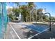 Outdoor basketball court with well-maintained surface, surrounded by trees and recreational areas at 5907 S Kings Hwy. # 1409, Myrtle Beach, SC 29575