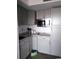 Updated kitchen with modern stainless steel appliances, granite countertops, and white subway tile backsplash at 5907 S Kings Hwy. # 1409, Myrtle Beach, SC 29575