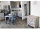 Charming eat-in kitchen with stainless steel appliances and granite countertops, adjacent to the living area at 5907 S Kings Hwy. # 1409, Myrtle Beach, SC 29575