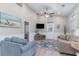 Cozy living room with beachy decor, neutral walls, ceiling fan and comfortable seating arrangement at 6001-1723 South Kings Hwy., Myrtle Beach, SC 29575