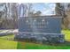 Community sign for The Reserve at Wild Horse, established in 2022, framed by trees and greenery at 616 Choctaw Dr., Conway, SC 29526