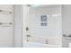 Bright bathroom featuring a shower over tub with white subway tile surround and custom tile accents at 641 Waterbridge Blvd., Myrtle Beach, SC 29579