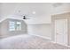Neutral bedroom with carpet, ceiling fan, natural light, and an attached ensuite bathroom at 641 Waterbridge Blvd., Myrtle Beach, SC 29579