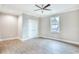 Spacious bedroom with gray wood floor, crown molding and a ceiling fan for comfort at 641 Waterbridge Blvd., Myrtle Beach, SC 29579