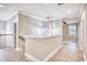 Bright upstairs hallway features hardwood flooring and neutral-toned walls and light fixtures at 641 Waterbridge Blvd., Myrtle Beach, SC 29579