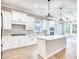Bright kitchen with stainless steel appliances, a large island, and lots of natural light at 641 Waterbridge Blvd., Myrtle Beach, SC 29579