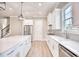 Modern kitchen with an island, stainless steel appliances, and subway tile backsplash at 641 Waterbridge Blvd., Myrtle Beach, SC 29579