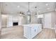 Bright, open-concept living space with hardwood floors and a modern kitchen island at 641 Waterbridge Blvd., Myrtle Beach, SC 29579