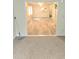 Inviting living room showcasing neutral flooring, fresh paint, and seamless access to other living spaces at 6512 Laguna Point, Myrtle Beach, SC 29588